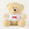 Teddy bear with red hearts.