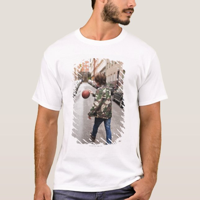 Teenage boy dribbling basketball T-Shirt (Front)