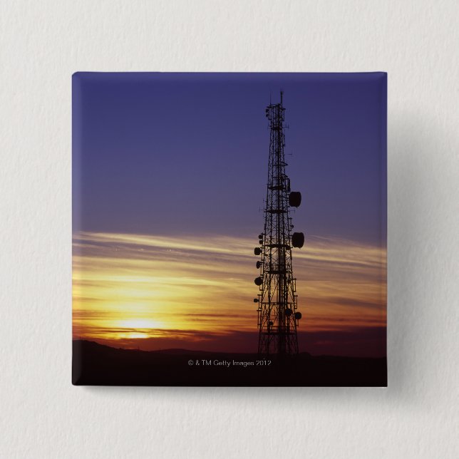 Telecommunications mast at sunset button (Front)