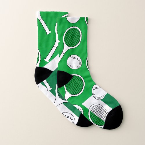 Tennis ball and racket black white on green court socks