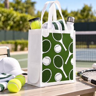 Tennis ball and racket black white on green grocery bag