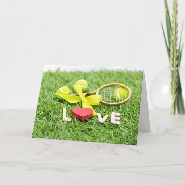 Tennis ball and racket on green grass with love   holiday card (Front)