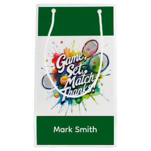 Tennis ball and racket on the court with name small gift bag