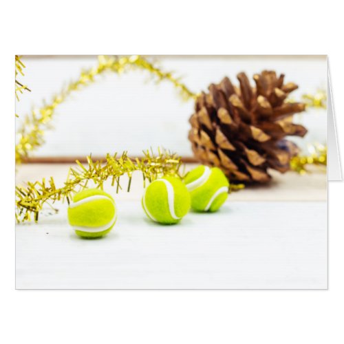 Tennis ball and racket with Christmas decoration Card