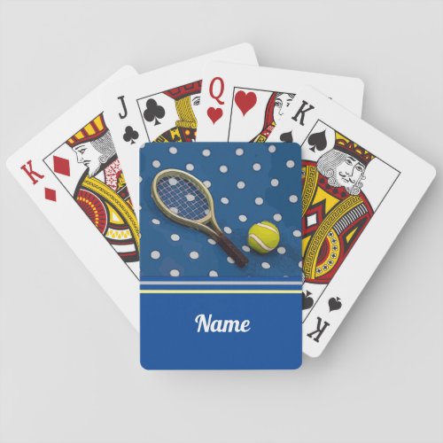 Tennis  ball and racket with white polka dots blue playing cards