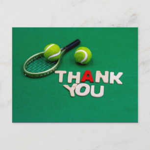 Tennis ball and thank you word on green postcard
