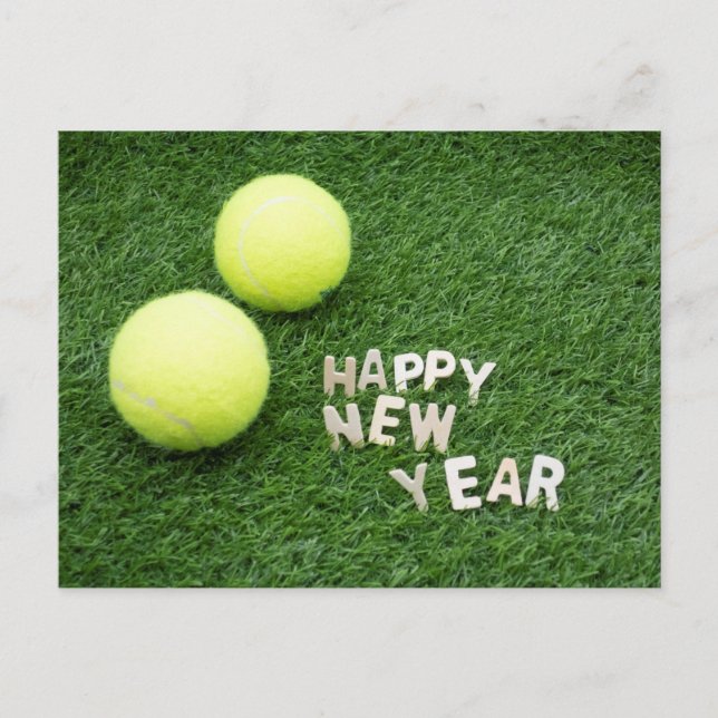 Tennis ball  Happy New Year on green grass Postcard (Front)