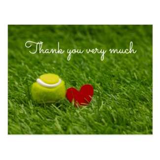 Tennis ball is on green grass with love thank you postcard