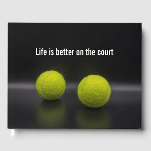 Tennis ball on black background life on court guest book