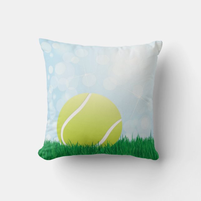 tennis ball on grass throw pillow (Front)