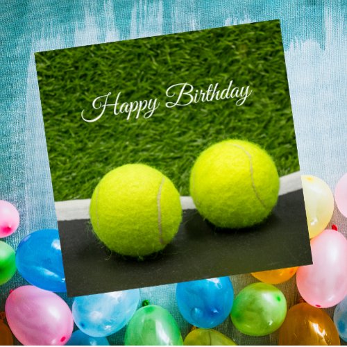 Tennis ball on green grass Birthday Card