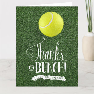 Tennis ball on green grass thank you card