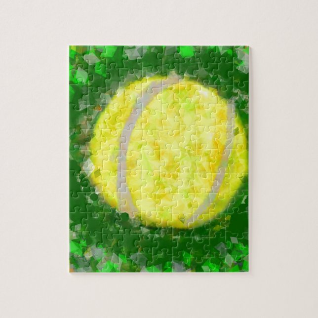 Tennis ball rests on the grass jigsaw puzzle (Vertical)