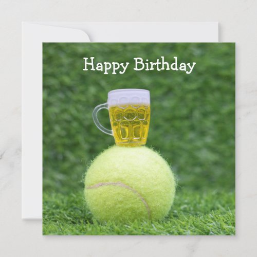 Tennis ball with beer on green grass birthday card