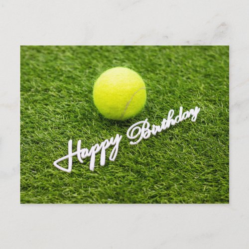 Tennis ball with happy birthday word on green postcard