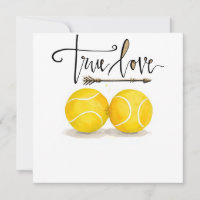 Tennis ball with  LOVE on blue court