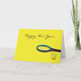 Tennis ball with racket on yellow Happy New Year Holiday Card