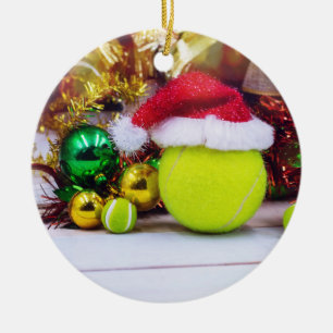 Tennis ball with Santa hat for Christmas Holiday Ceramic Ornament