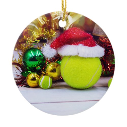 Tennis ball with Santa hat for Christmas Holiday Ceramic Ornament