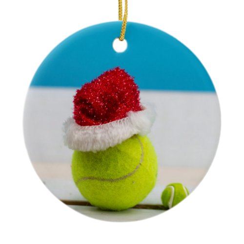 Tennis ball with Santa hat for Christmas Holiday Ceramic Ornament