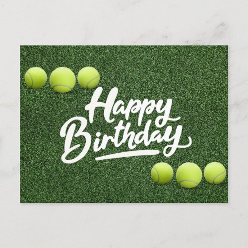 Tennis balls are on green grass birthday postcard