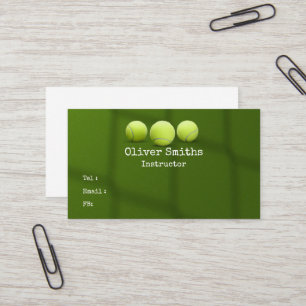 Tennis Coach Instructor with tennis ball on green Business Card