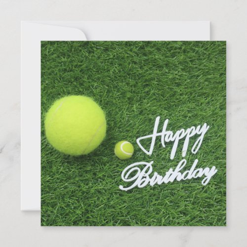 Tennis Happy birthday and balls on green grass