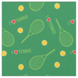 Tennis rackets on green background fabric