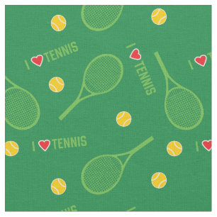 Tennis rackets on green background fabric