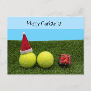 Tennis with Merry Christmas Santa hat on green Holiday Postcard