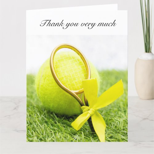 Tennis with racket and balls on green grass thank you card