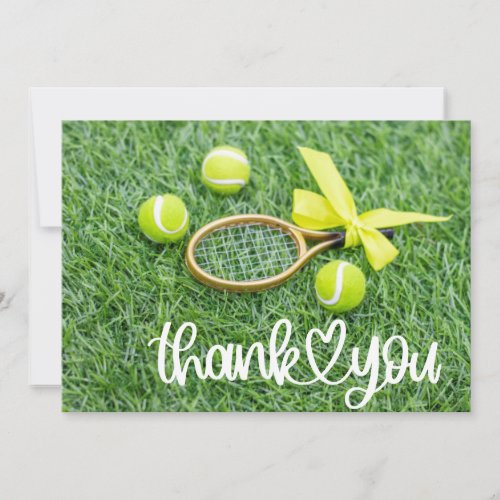 Tennis with racket and balls on green grass thank you card