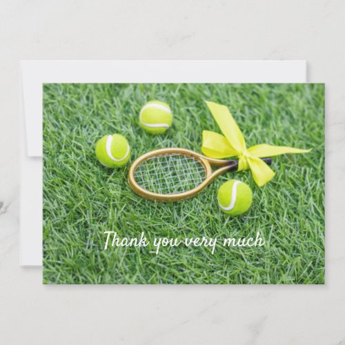 Tennis with racket and balls on green grass thank you card