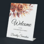 Terracotta Fall Flowers 18th Birthday Welcome Pedestal Sign<br><div class="desc">Welcome guests to your birthday party with this elegant terracotta orange fall flower design. Welcome and the birthday celebrant's name is written in a large trending font. The remainder of the text is a classic upright and font. Very easy to customize. This tabletop sign is easy to use and can...</div>
