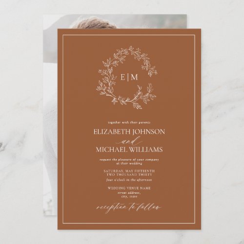 Terracotta Leafy Crest Monogram Photo Wedding  Invitation - We're loving this trendy, modern terracotta photo wedding invitation! Simple, elegant, and oh-so-pretty, it features a hand drawn leafy wreath encircling a modern wedding monogram. It is personalized in elegant typography, and accented with hand-lettered calligraphy. Finally, it is trimmed in a delicate frame and the back of the card showcases your favorite engagement photo. Veiw suite here: 
https://www.zazzle.com/collections/terracotta_leafy_crest_monogram_wedding-119356721080474481 Contact designer for matching products to complete the suite, OR for color variations of this design. Thank you sooo much for supporting our small business, we really appreciate it! 
We are so happy you love this design as much as we do, and would love to invite
you to be part of our new private Facebook group Wedding Planning Tips for Busy Brides. 
Join to receive the latest on sales, new releases and more! 
https://www.facebook.com/groups/622298402544171  
Copyright Anastasia Surridge for Elegant Invites, all rights reserved.