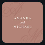 Terracotta Modern Edge Elegant Monogram Wedding Square Sticker<br><div class="desc">A simple modern minimalist design with an elegant edge, this unique sticker design features beautiful calligraphy script monograms of the bride and groom on alternate corners. The bride and groom's names are centered with a clean classic look on an earthy terracotta background with ivory text. Replace the sample text with...</div>