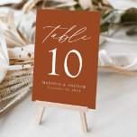 Terracotta Modern Elegance Wedding Table Number<br><div class="desc">Trendy, minimalist wedding table number cards featuring white modern lettering with "Table" in a modern calligraphy script. The design features a terracotta background or color of your choice. The design repeats on the back. To order the table cards: add your name, wedding date, and table number. Add each number to...</div>