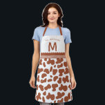 Terracotta Rust Custom Name & Monogram Cow Pattern Apron<br><div class="desc">Terracotta Rust Burnt Orange Custom Name & Monogram Cute Cow Pattern Apron, just add your custom family name or text and initial letter. A Color editable design, all elements can be changed to any color you desire by clicking Personalize this template and choosing customize further at the bottom of the...</div>