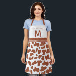 Terracotta Rust Custom Name & Monogram Cow Pattern Apron<br><div class="desc">Terracotta Rust Burnt Orange Custom Name & Monogram Cute Cow Pattern Apron, just add your custom family name or text and initial letter. A Color editable design, all elements can be changed to any color you desire by clicking Personalize this template and choosing customize further at the bottom of the...</div>