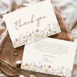 Terracotta Wildflower Bridal Shower Thank You Card<br><div class="desc">Express your gratitude with our Terracotta Wildflower Bridal Shower Thank You Card. This beautifully designed card captures the essence of nature's charm, featuring vibrant wildflowers against a warm terracotta backdrop. The delicate wildflowers symbolize the beauty and uniqueness of each moment shared during the bridal shower. The terracotta color palette adds...</div>
