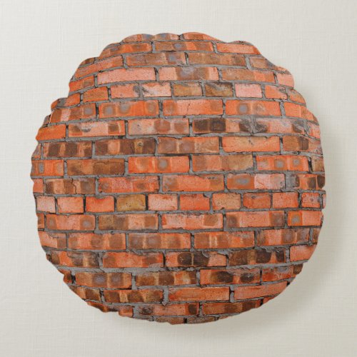 Texture of an old brick wall closeupagedarchitect round pillow