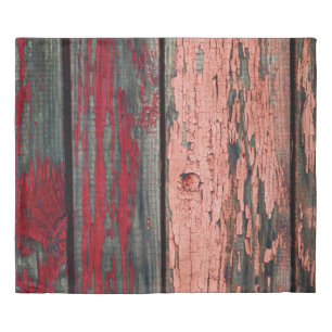Texture of old wooden fence painted in red and ora duvet cover