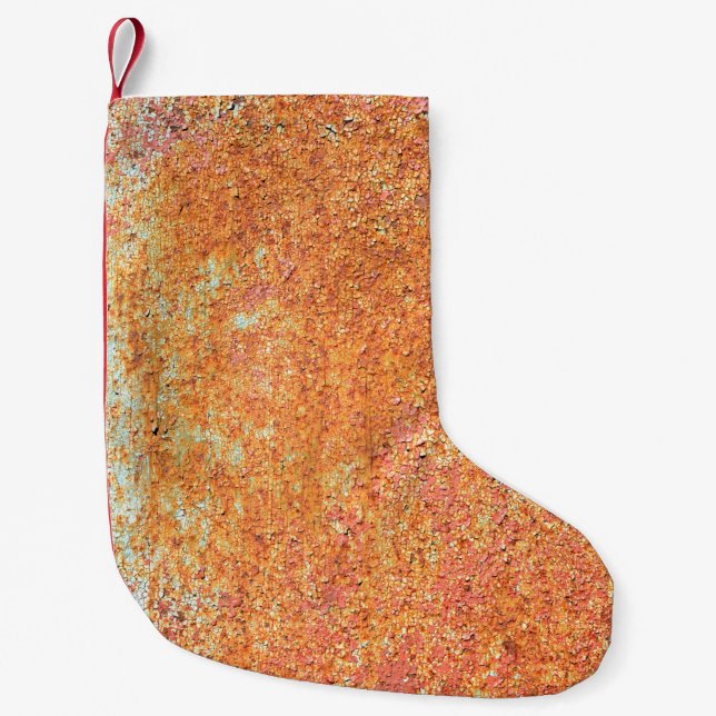 Texture of the old painted metalabstract, age, anc small christmas stocking (Front)