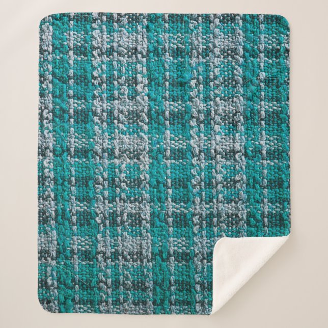 Texture of turquoise tartan fabric sherpa blanket (Front)