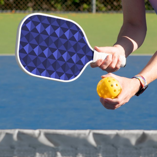 Textured blue triangles blocks pickleball paddle (Insitu)