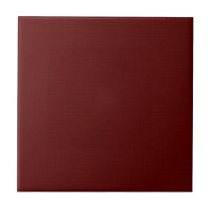 Textured dark red, red-brown. ceramic tile