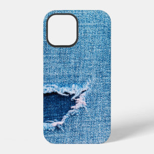 Textured denim background. Torn hole in the fabric iPhone 12 Case