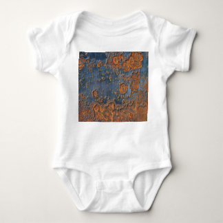 Textured rusted metal background. baby bodysuit
