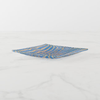 Textured, symmetrical blue and gold zebra pattern trinket tray