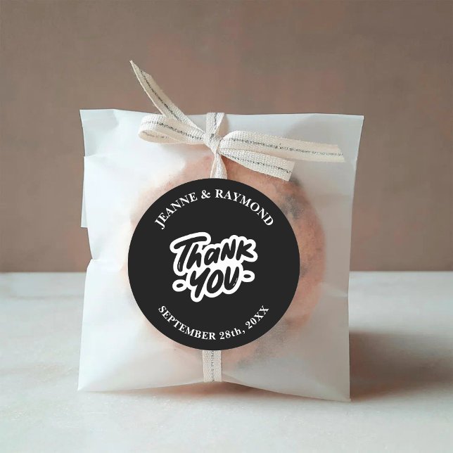Thank You Calligraphy Script Black Wedding Favor Classic Round Sticker (Black calligraphy thank you sticker adds elegant style to wedding favor packaging.)